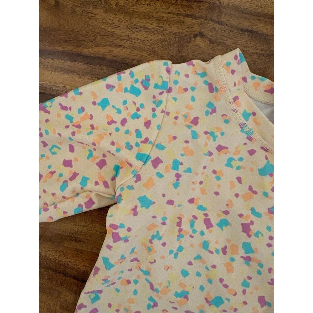 RuffleButts Long Sleeve Rash Guard Swimsuit, Confetti Beach, Size 2T